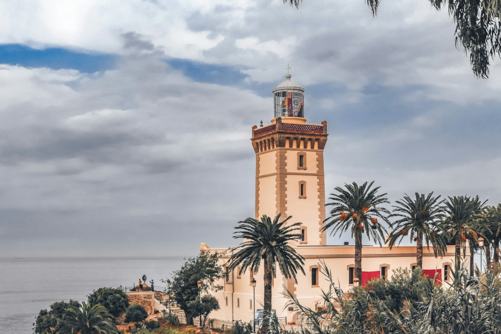 an old lighthouse facing the sea