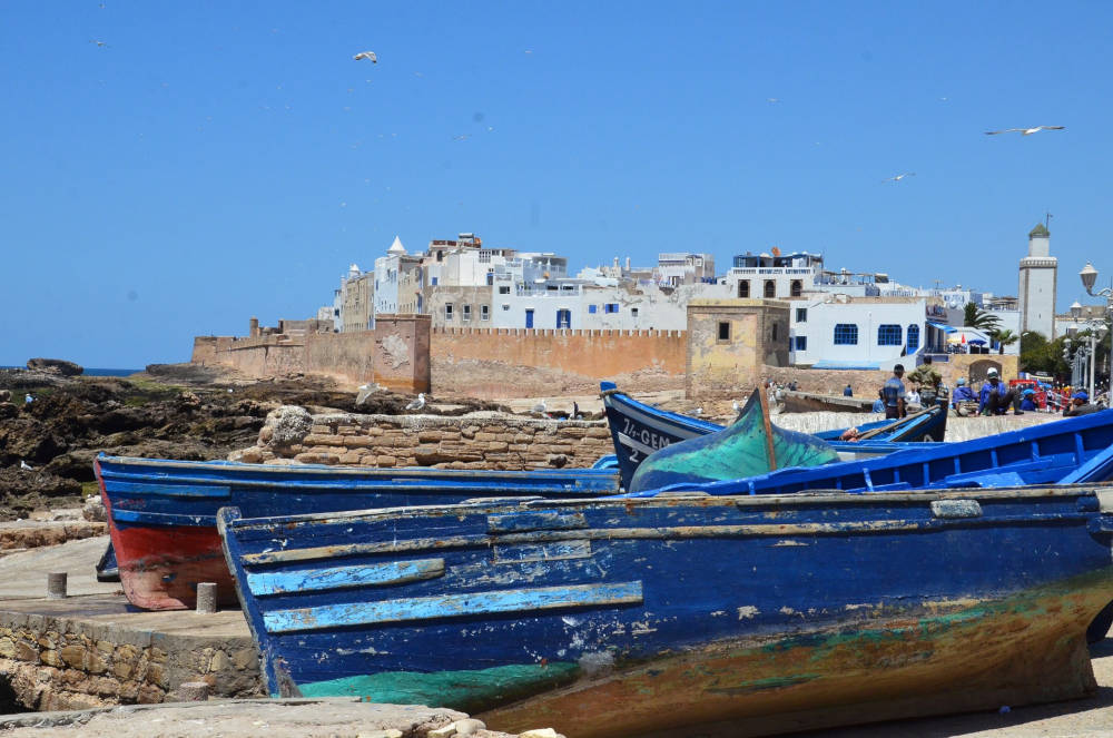 an old medina or castle standing on high cliff overlooking the ocean