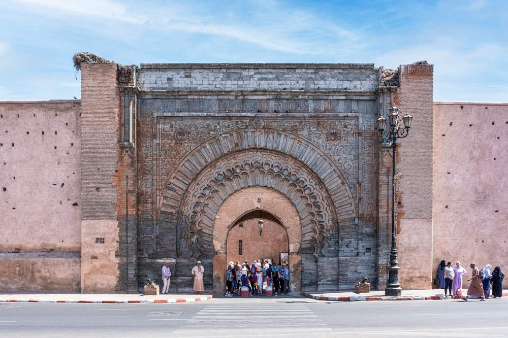 a large, beautifully-decorated, old doorway